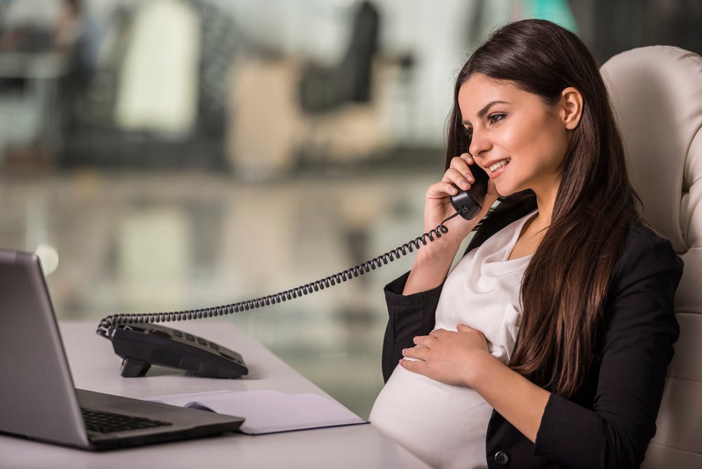 Pregnant businesswoman